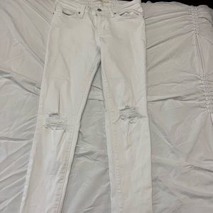 i have to many pairs of levi’s. white is the color, size 27